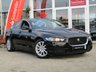 USED 2016 16 JAGUAR XE 2.0 SE 4d 178 BHP Finished in EBONY BLACK with contrasting DARK GREY interior. This XE stands out from the competition with its swooping, handsome looks. It is one of the best in its class for its drive, comfort, and practicallity.  Features include ONLY &pound;20 ROAD TAX, Sat Nav, DAB, B/Tooth, Cruise, Front and Rear Park Sensors. This is a fantastic family saloon car thats smart inside and sporty to drive. Hatfields Wakefield Jaguar Dealer serviced at 21638 miles, 43291 miles, 62785 miles and 72000 miles on arrival.