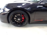 USED 2019 19 PORSCHE 911 3.0 CARRERA 4S PDK 2d 444 BHP THIS AMAZING ONE OWNER  SPORTS CAR COMES IN GLEAMING DEEP BLACK IT HAS ONLY COVERED 7800 MILES AND COMES IN PERFECT CONDITION, THFE 3.0L TWIN TURBO CHARED FLAT SIX PRODUCES A BREATHTAKING  444BHP LINKED TO THE ROAD BY AN AMAZING 4WD DRIVE SYSTEM. THE CAR HAS AN AMAZING SETOF FEATURES INCLUDING STUNNING GLOSS BLACK 20/21" ALLOY WHEELS,  WITH HEATED ELECTRIC ADJUST PERFORATED LEATHER SPORT SEATSCONTRASTING STITCHING AND HEADREST LOGOS, BRILLIANT 10.9 INCH FULL-COLOUR SAT NAV + MEDIA CENTRE WITH SA
