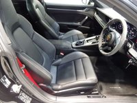 USED 2019 19 PORSCHE 911 3.0 CARRERA 4S PDK 2d 444 BHP THIS AMAZING ONE OWNER  SPORTS CAR COMES IN GLEAMING DEEP BLACK IT HAS ONLY COVERED 7800 MILES AND COMES IN PERFECT CONDITION, THFE 3.0L TWIN TURBO CHARED FLAT SIX PRODUCES A BREATHTAKING  444BHP LINKED TO THE ROAD BY AN AMAZING 4WD DRIVE SYSTEM. THE CAR HAS AN AMAZING SETOF FEATURES INCLUDING STUNNING GLOSS BLACK 20/21" ALLOY WHEELS,  WITH HEATED ELECTRIC ADJUST PERFORATED LEATHER SPORT SEATSCONTRASTING STITCHING AND HEADREST LOGOS, BRILLIANT 10.9 INCH FULL-COLOUR SAT NAV + MEDIA CENTRE WITH SA