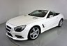 USED 2013 63 MERCEDES-BENZ SL 3.5 SL350 2d 306 BHP-DIAMOND WHITE METALLIC-HEATED RED LEATHER-ACTIVE PARK ASSIST-SPORTS STEERING WHEEL-CLIMATE CONTROL-CRUISE CONTROL-AIRSCARF SYSTEM AT FRONT-GLASS ROOF-SPORTS SUSPENSION-COMAND APS WITH DVD CHANGER-AMG 19