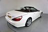 USED 2013 63 MERCEDES-BENZ SL 3.5 SL350 2d 306 BHP-DIAMOND WHITE METALLIC-HEATED RED LEATHER-ACTIVE PARK ASSIST-SPORTS STEERING WHEEL-CLIMATE CONTROL-CRUISE CONTROL-AIRSCARF SYSTEM AT FRONT-GLASS ROOF-SPORTS SUSPENSION-COMAND APS WITH DVD CHANGER-AMG 19