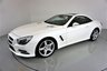 USED 2013 63 MERCEDES-BENZ SL 3.5 SL350 2d 306 BHP-DIAMOND WHITE METALLIC-HEATED RED LEATHER-ACTIVE PARK ASSIST-SPORTS STEERING WHEEL-CLIMATE CONTROL-CRUISE CONTROL-AIRSCARF SYSTEM AT FRONT-GLASS ROOF-SPORTS SUSPENSION-COMAND APS WITH DVD CHANGER-AMG 19