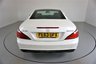 USED 2013 63 MERCEDES-BENZ SL 3.5 SL350 2d 306 BHP-DIAMOND WHITE METALLIC-HEATED RED LEATHER-ACTIVE PARK ASSIST-SPORTS STEERING WHEEL-CLIMATE CONTROL-CRUISE CONTROL-AIRSCARF SYSTEM AT FRONT-GLASS ROOF-SPORTS SUSPENSION-COMAND APS WITH DVD CHANGER-AMG 19