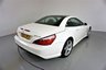 USED 2013 63 MERCEDES-BENZ SL 3.5 SL350 2d 306 BHP-DIAMOND WHITE METALLIC-HEATED RED LEATHER-ACTIVE PARK ASSIST-SPORTS STEERING WHEEL-CLIMATE CONTROL-CRUISE CONTROL-AIRSCARF SYSTEM AT FRONT-GLASS ROOF-SPORTS SUSPENSION-COMAND APS WITH DVD CHANGER-AMG 19