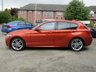 USED 2015 15 BMW 1 SERIES 2.0 118D M SPORT 5d 147 BHP Finished in VALENICIA ORANGE METALLIC with contrasting BLACK HEATED LEATHER trim. If you are looking for a small hatchback with that spacious feel and enjoy driving then look no further. This punchy mid sized hatch kicks out a lively 147 BHP and is packed with extras. Features include 18" Alloys, &pound;20 Road Tax, Full Heated leather Trim, Sat Nav, DAB Radio, B/Tooth, Xenons, Front and Rear Parking Sensors and much more. Dealer serviced at 9964 miles, 27246 miles, 57541 miles and at 70303 miles