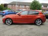 USED 2015 15 BMW 1 SERIES 2.0 118D M SPORT 5d 147 BHP Finished in VALENICIA ORANGE METALLIC with contrasting BLACK HEATED LEATHER trim. If you are looking for a small hatchback with that spacious feel and enjoy driving then look no further. This punchy mid sized hatch kicks out a lively 147 BHP and is packed with extras. Features include 18" Alloys, &pound;20 Road Tax, Full Heated leather Trim, Sat Nav, DAB Radio, B/Tooth, Xenons, Front and Rear Parking Sensors and much more. Dealer serviced at 9964 miles, 27246 miles, 57541 miles and at 70303 miles