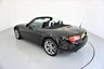 USED 2015 15 MAZDA MX-5 1.8 I SPORT VENTURE 2d-2 OWNER CAR-LOVELY LOW MILEAGE EXAMPLE-The Mazda MX-5 Venture is a special limited edition of the worlds most popular open top sports car. It features an upgraded and luxurious specification, advanced technology, premium interior trim and exterior colours exclusive to this particular model. Its stand out specification includes 17-inch alloy wheels, front fog lights, chrome front grille, piano black fashion bars and special Venture Edition badging. Inside, the MX-5 Venture Roadster has heated leather seats, leather steering wheel and hand brake with contrasting grey stitching, matching door trim, climate control, air-conditioning, piano black dashboard accents, alloy pedals, cruise control, heated seats and a satellite navigation system featuring a fully integrated 5.8-inch touch screen monitor, 4GB SD card based map (45 countries), live services, and iPod and Bluetooth connectivity complete with multi-media functionality. Renowned as a fun, everyday sports car, this particular MX-5 Venture is the 1.8 Roadster version and is one of only 500 cars in the UK 