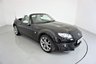 USED 2015 15 MAZDA MX-5 1.8 I SPORT VENTURE 2d-2 OWNER CAR-LOVELY LOW MILEAGE EXAMPLE-The Mazda MX-5 Venture is a special limited edition of the worlds most popular open top sports car. It features an upgraded and luxurious specification, advanced technology, premium interior trim and exterior colours exclusive to this particular model. Its stand out specification includes 17-inch alloy wheels, front fog lights, chrome front grille, piano black fashion bars and special Venture Edition badging. Inside, the MX-5 Venture Roadster has heated leather seats, leather steering wheel and hand brake with contrasting grey stitching, matching door trim, climate control, air-conditioning, piano black dashboard accents, alloy pedals, cruise control, heated seats and a satellite navigation system featuring a fully integrated 5.8-inch touch screen monitor, 4GB SD card based map (45 countries), live services, and iPod and Bluetooth connectivity complete with multi-media functionality. Renowned as a fun, everyday sports car, this particular MX-5 Venture is the 1.8 Roadster version and is one of only 500 cars in the UK 