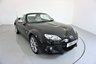 USED 2015 15 MAZDA MX-5 1.8 I SPORT VENTURE 2d-2 OWNER CAR-LOVELY LOW MILEAGE EXAMPLE-The Mazda MX-5 Venture is a special limited edition of the worlds most popular open top sports car. It features an upgraded and luxurious specification, advanced technology, premium interior trim and exterior colours exclusive to this particular model. Its stand out specification includes 17-inch alloy wheels, front fog lights, chrome front grille, piano black fashion bars and special Venture Edition badging. Inside, the MX-5 Venture Roadster has heated leather seats, leather steering wheel and hand brake with contrasting grey stitching, matching door trim, climate control, air-conditioning, piano black dashboard accents, alloy pedals, cruise control, heated seats and a satellite navigation system featuring a fully integrated 5.8-inch touch screen monitor, 4GB SD card based map (45 countries), live services, and iPod and Bluetooth connectivity complete with multi-media functionality. Renowned as a fun, everyday sports car, this particular MX-5 Venture is the 1.8 Roadster version and is one of only 500 cars in the UK 