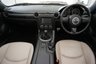 USED 2015 15 MAZDA MX-5 1.8 I SPORT VENTURE 2d-2 OWNER CAR-LOVELY LOW MILEAGE EXAMPLE-The Mazda MX-5 Venture is a special limited edition of the worlds most popular open top sports car. It features an upgraded and luxurious specification, advanced technology, premium interior trim and exterior colours exclusive to this particular model. Its stand out specification includes 17-inch alloy wheels, front fog lights, chrome front grille, piano black fashion bars and special Venture Edition badging. Inside, the MX-5 Venture Roadster has heated leather seats, leather steering wheel and hand brake with contrasting grey stitching, matching door trim, climate control, air-conditioning, piano black dashboard accents, alloy pedals, cruise control, heated seats and a satellite navigation system featuring a fully integrated 5.8-inch touch screen monitor, 4GB SD card based map (45 countries), live services, and iPod and Bluetooth connectivity complete with multi-media functionality. Renowned as a fun, everyday sports car, this particular MX-5 Venture is the 1.8 Roadster version and is one of only 500 cars in the UK 