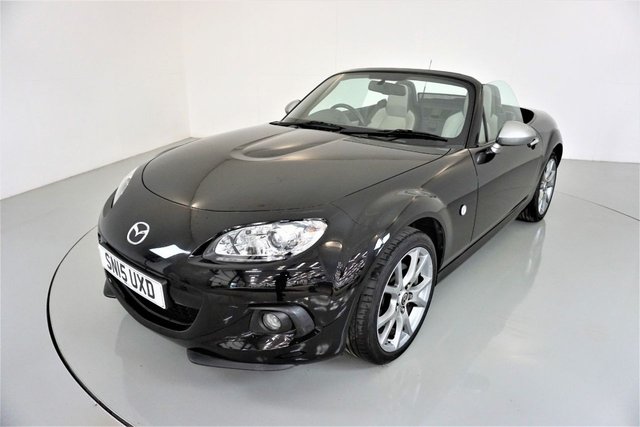 2015 15 Mazda MX-5 1.8 I SPORT VENTURE 2d-2 OWNER CAR-LOVELY LOW MILEAGE EXAMPLE-The Mazda MX-5 Venture is a special limited edition of the worlds most popular open top sports car. It features an upgraded and luxurious specification, advanced technology, premium interior trim and exterior colours exclusive to this particular model. Its stand out specification includes 17-inch alloy wheels, front fog lights, chrome front grille, piano black fashion bars and special Venture Edition badging. Inside, the MX-5 Venture Roadster has heated leather seats, leather steering wheel and hand brake with contrasting grey stitching, matching door trim, climate control, air-conditioning, piano black dashboard accents, alloy pedals, cruise control, heated seats and a satellite navigation system featuring a fully integrated 5.8-inch touch screen monitor, 4GB SD card based map (45 countries), live services, and iPod and Bluetooth connectivity complete with multi-media functionality. Renowned as a fun, everyday sports car, this particular MX-5 Venture is the 1.8 Roadster version and is one of only 500 cars in the UK