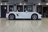 USED 2012 62 PORSCHE BOXSTER 3.4 24V S PDK 2d AUTO 315 BHP FINISHED IN STUNNING WHITE, WITH BEAUTIFULLY CONTRASTING RED ROOF AND FULL RED LEATHER SPORTS SEATS AND UPHOLSTERY + THOUSANDS OF POUNDS OF ADDITIONAL SPECIFICATION + IMPECCABLE SERVICED AND COMES WITH A FULLY DOCUMENTED PORSCHE SERVICE HISTORY + SATELLITE NAVIGATION + PDK DUAL CLUTCH AUTO +  BLUETOOTH CONNECTIVITY + SPORT EXHAUST SYSTEM + BOSE SURROUND SOUND SPEAKER SYSTEM + PORSCHE COMMUNICATION MANAGEMENT + 2-ZONE CLIMATE CONTROL + AUTOMATIC XENON HEADLIGHTS + CRUISE CONTROL + ECO STOP/START