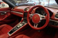 USED 2012 62 PORSCHE BOXSTER 3.4 24V S PDK 2d AUTO 315 BHP FINISHED IN STUNNING WHITE, WITH BEAUTIFULLY CONTRASTING RED ROOF AND FULL RED LEATHER SPORTS SEATS AND UPHOLSTERY + THOUSANDS OF POUNDS OF ADDITIONAL SPECIFICATION + IMPECCABLE SERVICED AND COMES WITH A FULLY DOCUMENTED PORSCHE SERVICE HISTORY + SATELLITE NAVIGATION + PDK DUAL CLUTCH AUTO +  BLUETOOTH CONNECTIVITY + SPORT EXHAUST SYSTEM + BOSE SURROUND SOUND SPEAKER SYSTEM + PORSCHE COMMUNICATION MANAGEMENT + 2-ZONE CLIMATE CONTROL + AUTOMATIC XENON HEADLIGHTS + CRUISE CONTROL + ECO STOP/START