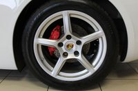 USED 2012 62 PORSCHE BOXSTER 3.4 24V S PDK 2d AUTO 315 BHP FINISHED IN STUNNING WHITE, WITH BEAUTIFULLY CONTRASTING RED ROOF AND FULL RED LEATHER SPORTS SEATS AND UPHOLSTERY + THOUSANDS OF POUNDS OF ADDITIONAL SPECIFICATION + IMPECCABLE SERVICED AND COMES WITH A FULLY DOCUMENTED PORSCHE SERVICE HISTORY + SATELLITE NAVIGATION + PDK DUAL CLUTCH AUTO +  BLUETOOTH CONNECTIVITY + SPORT EXHAUST SYSTEM + BOSE SURROUND SOUND SPEAKER SYSTEM + PORSCHE COMMUNICATION MANAGEMENT + 2-ZONE CLIMATE CONTROL + AUTOMATIC XENON HEADLIGHTS + CRUISE CONTROL + ECO STOP/START