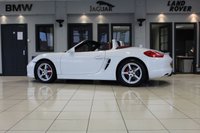 USED 2012 62 PORSCHE BOXSTER 3.4 24V S PDK 2d AUTO 315 BHP FINISHED IN STUNNING WHITE, WITH BEAUTIFULLY CONTRASTING RED ROOF AND FULL RED LEATHER SPORTS SEATS AND UPHOLSTERY + THOUSANDS OF POUNDS OF ADDITIONAL SPECIFICATION + IMPECCABLE SERVICED AND COMES WITH A FULLY DOCUMENTED PORSCHE SERVICE HISTORY + SATELLITE NAVIGATION + PDK DUAL CLUTCH AUTO +  BLUETOOTH CONNECTIVITY + SPORT EXHAUST SYSTEM + BOSE SURROUND SOUND SPEAKER SYSTEM + PORSCHE COMMUNICATION MANAGEMENT + 2-ZONE CLIMATE CONTROL + AUTOMATIC XENON HEADLIGHTS + CRUISE CONTROL + ECO STOP/START