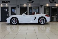 USED 2012 62 PORSCHE BOXSTER 3.4 24V S PDK 2d AUTO 315 BHP FINISHED IN STUNNING WHITE, WITH BEAUTIFULLY CONTRASTING RED ROOF AND FULL RED LEATHER SPORTS SEATS AND UPHOLSTERY + THOUSANDS OF POUNDS OF ADDITIONAL SPECIFICATION + IMPECCABLE SERVICED AND COMES WITH A FULLY DOCUMENTED PORSCHE SERVICE HISTORY + SATELLITE NAVIGATION + PDK DUAL CLUTCH AUTO +  BLUETOOTH CONNECTIVITY + SPORT EXHAUST SYSTEM + BOSE SURROUND SOUND SPEAKER SYSTEM + PORSCHE COMMUNICATION MANAGEMENT + 2-ZONE CLIMATE CONTROL + AUTOMATIC XENON HEADLIGHTS + CRUISE CONTROL + ECO STOP/START