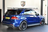 USED 2018 18 MERCEDES-BENZ GLE-CLASS 5.5 AMG GLE 63 S 4MATIC NIGHT EDITION 5d AUTO 577 BHP FULL MERCEDES BENZ SERVICE HISTORY + REAR SEAT ENTERTAINMENT SYSTEM + HEATED SPORTS SEATS + SATELLITE NAVIGATION + PANORAMIC SUNROOF + PARKING SENSOR + HARMAN/KARDON PREMIUM SPEAKERS + AMG MULTI FUNCTION STEERING WHEEL+ ELECTRIC/HEATED/FOLDING DOOR MIRRORS + 21 INCH ALLOY WHEELS