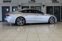 USED 2019 19 AUDI A7 3.0 SPORTBACK TDI QUATTRO S LINE 5d AUTO 282 BHP FINISHED IN A STUNNING METALLIC SILVER, COMPLIMENTED WITH BLACK HEATED HALF LEATHER AND SUEDE SEATS WITH ELECTRIC ADJUSTMENT AND MEMORY PROGRAMME + 1 OWNER FROM NEW, COMES WITH A FULL AUDI SERVICE HISTORY AND THE BALANCE OF AUDI'S MANUFACTURERS WARRANTY UNTIL MARCH 2022 + A SIMPLY OUTSTANDING EXAMPLE + AUDI VIRTUAL COCKPIT DIGITAL DASH DISPLAY +  MMI NAV PLUS SATELLITE NAVIGATION + REVERSE CAMERA + APPLE CARPLAY AND ANDROID AUTO + AUTOMATIC BI XENON HEADLIGHTS + 21 INCH ALLOY WHEELS