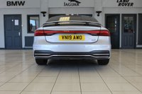 USED 2019 19 AUDI A7 3.0 SPORTBACK TDI QUATTRO S LINE 5d AUTO 282 BHP FINISHED IN A STUNNING METALLIC SILVER, COMPLIMENTED WITH BLACK HEATED HALF LEATHER AND SUEDE SEATS WITH ELECTRIC ADJUSTMENT AND MEMORY PROGRAMME + 1 OWNER FROM NEW, COMES WITH A FULL AUDI SERVICE HISTORY AND THE BALANCE OF AUDI'S MANUFACTURERS WARRANTY UNTIL MARCH 2022 + A SIMPLY OUTSTANDING EXAMPLE + AUDI VIRTUAL COCKPIT DIGITAL DASH DISPLAY +  MMI NAV PLUS SATELLITE NAVIGATION + REVERSE CAMERA + APPLE CARPLAY AND ANDROID AUTO + AUTOMATIC BI XENON HEADLIGHTS + 21 INCH ALLOY WHEELS