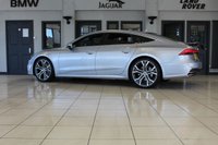 USED 2019 19 AUDI A7 3.0 SPORTBACK TDI QUATTRO S LINE 5d AUTO 282 BHP FINISHED IN A STUNNING METALLIC SILVER, COMPLIMENTED WITH BLACK HEATED HALF LEATHER AND SUEDE SEATS WITH ELECTRIC ADJUSTMENT AND MEMORY PROGRAMME + 1 OWNER FROM NEW, COMES WITH A FULL AUDI SERVICE HISTORY AND THE BALANCE OF AUDI'S MANUFACTURERS WARRANTY UNTIL MARCH 2022 + A SIMPLY OUTSTANDING EXAMPLE + AUDI VIRTUAL COCKPIT DIGITAL DASH DISPLAY +  MMI NAV PLUS SATELLITE NAVIGATION + REVERSE CAMERA + APPLE CARPLAY AND ANDROID AUTO + AUTOMATIC BI XENON HEADLIGHTS + 21 INCH ALLOY WHEELS