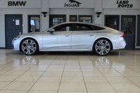 USED 2019 19 AUDI A7 3.0 SPORTBACK TDI QUATTRO S LINE 5d AUTO 282 BHP FINISHED IN A STUNNING METALLIC SILVER, COMPLIMENTED WITH BLACK HEATED HALF LEATHER AND SUEDE SEATS WITH ELECTRIC ADJUSTMENT AND MEMORY PROGRAMME + 1 OWNER FROM NEW, COMES WITH A FULL AUDI SERVICE HISTORY AND THE BALANCE OF AUDI'S MANUFACTURERS WARRANTY UNTIL MARCH 2022 + A SIMPLY OUTSTANDING EXAMPLE + AUDI VIRTUAL COCKPIT DIGITAL DASH DISPLAY +  MMI NAV PLUS SATELLITE NAVIGATION + REVERSE CAMERA + APPLE CARPLAY AND ANDROID AUTO + AUTOMATIC BI XENON HEADLIGHTS + 21 INCH ALLOY WHEELS