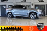 USED 2018 68 BMW X6 3.0 XDRIVE30D M SPORT 4d AUTO 255 BHP FINISHED IN STUNNING METALLIC GREY WITH ELECTRICALLY ADJUSTABLE FULL BLACK LEATHER HEATED SEATS WITH MEMORY PACK PLUS LUMBAR SUPPORT + 1 OWNER FROM NEW WITH A FULLY DOCUMENTED BMW MAIN DEALER SERVICE HISTORY AND THE BALANCE OF BMW'S MANUFACTURERS WARRANTY UNTIL OCTOBER 2021 + PROFESSIONAL SATELLITE NAVIGATION AND MEDIA + DRIVING ASSISTANT + DAB DIGITAL RADIO + BLUETOOTH MEDIA + HARMON KARDON SURROUND SOUND SYSTEM + HEATED FRONT AND REAR SEATS + HEAD UP DISPLAY + VOICE COMMAND + 360 VIEW CAMERA
