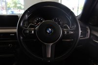 USED 2018 68 BMW X6 3.0 XDRIVE30D M SPORT 4d AUTO 255 BHP FINISHED IN STUNNING METALLIC GREY WITH ELECTRICALLY ADJUSTABLE FULL BLACK LEATHER HEATED SEATS WITH MEMORY PACK PLUS LUMBAR SUPPORT + 1 OWNER FROM NEW WITH A FULLY DOCUMENTED BMW MAIN DEALER SERVICE HISTORY AND THE BALANCE OF BMW'S MANUFACTURERS WARRANTY UNTIL OCTOBER 2021 + PROFESSIONAL SATELLITE NAVIGATION AND MEDIA + DRIVING ASSISTANT + DAB DIGITAL RADIO + BLUETOOTH MEDIA + HARMON KARDON SURROUND SOUND SYSTEM + HEATED FRONT AND REAR SEATS + HEAD UP DISPLAY + VOICE COMMAND + 360 VIEW CAMERA