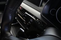 USED 2018 68 BMW X6 3.0 XDRIVE30D M SPORT 4d AUTO 255 BHP FINISHED IN STUNNING METALLIC GREY WITH ELECTRICALLY ADJUSTABLE FULL BLACK LEATHER HEATED SEATS WITH MEMORY PACK PLUS LUMBAR SUPPORT + 1 OWNER FROM NEW WITH A FULLY DOCUMENTED BMW MAIN DEALER SERVICE HISTORY AND THE BALANCE OF BMW'S MANUFACTURERS WARRANTY UNTIL OCTOBER 2021 + PROFESSIONAL SATELLITE NAVIGATION AND MEDIA + DRIVING ASSISTANT + DAB DIGITAL RADIO + BLUETOOTH MEDIA + HARMON KARDON SURROUND SOUND SYSTEM + HEATED FRONT AND REAR SEATS + HEAD UP DISPLAY + VOICE COMMAND + 360 VIEW CAMERA