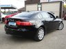 USED 2016 16 JAGUAR XE 2.0 SE 4d 178 BHP Finished in EBONY BLACK with contrasting DARK GREY interior. This XE stands out from the competition with its swooping, handsome looks. It is one of the best in its class for its drive, comfort, and practicallity. Features include ONLY &pound;20 ROAD TAX, Sat Nav, DAB, B/Tooth, Cruise, Front and Rear Park Sensors. This is a fantastic family saloon car thats smart inside and sporty to drive. Hatfields Wakefield Jaguar Dealer serviced at 21638 miles, 43291 miles, 62785 miles and 72000 miles on arrival