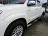 USED 2013 13 TOYOTA HI-LUX 3.0 INVINCIBLE 4X4 D-4D DCB 169 BHP Finished in WHITE with GREY CLOTH TRIM. This refined and rugged and very clean HI-LUX is the complete pick-up package. It is stylish, practical and capable of hauling huge loads. Features include, NO VAT,  Side Bars, Cruise Control, Rear View Camera, B/Tooth and much more. 12 Months MOT.