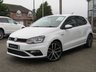 USED 2016 16 VOLKSWAGEN POLO 1.8 GTI 5d 189 BHP Finished in PURE WHITE with contrasting retro cloth trim. This Polo is quick and great fun to drive. The Polo is one of the best selling and popular small cars around. It is very comfortable and practical, with a distinct upmarket feel to it. Features include 17" Alloys, DAB, 2 Keys, B/Tooth, Daytime Run Lights and much more. Dealer serviced at 12488 miles, 19691 miles, 27527 miles and on arrival at 39387 miles. 12 Months MOT.