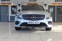 USED 2016 66 MERCEDES-BENZ GLC-CLASS 3.0 AMG GLC 43 4MATIC PREMIUM PLUS 5d AUTO 362 BHP FINISHED IN STUNNING METALLIC DIAMOND SILVER, COMPLIMENTED WITH BLACK PART LEATHER AND SUEDE HEATED SEATS WITH ELECTRIC ADJUSTMENT AND MEMORY PROGRAMME + CARBON FIBRE INTERIOR TRIM PACKAGE + 1 FORMER KEEPER, HUGE SPECIFICATION AND WONDERFULLY WELL CARED FOR INCLUDING A FULLY DOCUMENTED SERVICE HISTORY + PREMIUM PLUS PACKAGE + ELECTRIC PANORAMIC GLASS SUNROOF + COMMAND SATELLITE NAVIGATION + REVERSING CAMERA + ACTIVE PARKING ASSISTANCE + UPGRADED BERMESTER SOUND SYSTEM + FRONT AND REAR PARKING