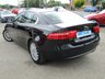 USED 2016 16 JAGUAR XE 2.0 PORTFOLIO 4d 161 BHP Finished in EBONY BLACK with contrasting BLACK HEATED LEATHER interior. This XE stands out from the competition with its swooping, handsome looks. It is one of the best in its class for its drive, comfort, and practicallity. Features include ONLY &pound;20 ROAD TAX, Sat Nav, DAB, B/Tooth, Cruise, Front and Rear Park Sensors. This is a Top of the Range fantastic family saloon car thats smart inside and sporty to drive. Jaguar Dealer serviced at 21502 miles, 44056 miles, 64655 miles and at 85847 miles.