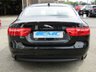 USED 2016 16 JAGUAR XE 2.0 PORTFOLIO 4d 161 BHP Finished in EBONY BLACK with contrasting BLACK HEATED LEATHER interior. This XE stands out from the competition with its swooping, handsome looks. It is one of the best in its class for its drive, comfort, and practicallity. Features include ONLY &pound;20 ROAD TAX, Sat Nav, DAB, B/Tooth, Cruise, Front and Rear Park Sensors. This is a Top of the Range fantastic family saloon car thats smart inside and sporty to drive. Jaguar Dealer serviced at 21502 miles, 44056 miles, 64655 miles and at 85847 miles.
