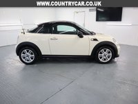 USED 2014 63 MINI COUPE 1.6 COOPER 2d 120 BHP WHITE COOPER COUPE WITH PEPPERPACK AND TWIN SPOKE ALLOY WHEELS AS FITTED FACTORY EXTRAS PLUS FULL BLUETOOTH PHONE WITH USB AUDIO THIS CAR IS QUITE SPECIAL