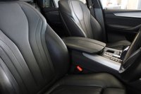 USED 2016 66 BMW X5 3.0 XDRIVE30D M SPORT 5d AUTO 255 BHP FINISHED IN STUNNING SPACE GREY METALLIC, COMPLIMENTED WITH BLACK LEATHER HEATED FRONT & REAR SEAT, ELECTRICALLY ADJUSTABLE SEATS WITH MEMORY PROGRAM + HUGE SPECIFICATION 7 SEATER, COMES WITH A FULL SERVICE HISTORY + ELECTRIC PANORAMIC GLASS SUNROOF + M SPORT PLUS PACKAGE + 360 DEGREE SURROUND VIEW + REAR VIEW CAMERA + LIGHT PACKAGE + PROFESSIONAL SATELLITE NAVIGATION + HEAD UP DISPLAY + FRONT AND REAR PARKING SENSORS + UPGRADED SOUND SYSTEM HARMAN/KARDON + BLUETOOTH PHONE AND MEDIA CONNECTIVITY