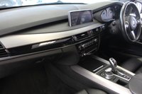 USED 2016 66 BMW X5 3.0 XDRIVE30D M SPORT 5d AUTO 255 BHP FINISHED IN STUNNING SPACE GREY METALLIC, COMPLIMENTED WITH BLACK LEATHER HEATED FRONT & REAR SEAT, ELECTRICALLY ADJUSTABLE SEATS WITH MEMORY PROGRAM + HUGE SPECIFICATION 7 SEATER, COMES WITH A FULL SERVICE HISTORY + ELECTRIC PANORAMIC GLASS SUNROOF + M SPORT PLUS PACKAGE + 360 DEGREE SURROUND VIEW + REAR VIEW CAMERA + LIGHT PACKAGE + PROFESSIONAL SATELLITE NAVIGATION + HEAD UP DISPLAY + FRONT AND REAR PARKING SENSORS + UPGRADED SOUND SYSTEM HARMAN/KARDON + BLUETOOTH PHONE AND MEDIA CONNECTIVITY
