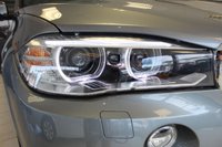 USED 2016 66 BMW X5 3.0 XDRIVE30D M SPORT 5d AUTO 255 BHP FINISHED IN STUNNING SPACE GREY METALLIC, COMPLIMENTED WITH BLACK LEATHER HEATED FRONT & REAR SEAT, ELECTRICALLY ADJUSTABLE SEATS WITH MEMORY PROGRAM + HUGE SPECIFICATION 7 SEATER, COMES WITH A FULL SERVICE HISTORY + ELECTRIC PANORAMIC GLASS SUNROOF + M SPORT PLUS PACKAGE + 360 DEGREE SURROUND VIEW + REAR VIEW CAMERA + LIGHT PACKAGE + PROFESSIONAL SATELLITE NAVIGATION + HEAD UP DISPLAY + FRONT AND REAR PARKING SENSORS + UPGRADED SOUND SYSTEM HARMAN/KARDON + BLUETOOTH PHONE AND MEDIA CONNECTIVITY