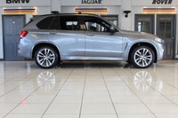 USED 2016 66 BMW X5 3.0 XDRIVE30D M SPORT 5d AUTO 255 BHP FINISHED IN STUNNING SPACE GREY METALLIC, COMPLIMENTED WITH BLACK LEATHER HEATED FRONT & REAR SEAT, ELECTRICALLY ADJUSTABLE SEATS WITH MEMORY PROGRAM + HUGE SPECIFICATION 7 SEATER, COMES WITH A FULL SERVICE HISTORY + ELECTRIC PANORAMIC GLASS SUNROOF + M SPORT PLUS PACKAGE + 360 DEGREE SURROUND VIEW + REAR VIEW CAMERA + LIGHT PACKAGE + PROFESSIONAL SATELLITE NAVIGATION + HEAD UP DISPLAY + FRONT AND REAR PARKING SENSORS + UPGRADED SOUND SYSTEM HARMAN/KARDON + BLUETOOTH PHONE AND MEDIA CONNECTIVITY