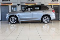USED 2016 66 BMW X5 3.0 XDRIVE30D M SPORT 5d AUTO 255 BHP FINISHED IN STUNNING SPACE GREY METALLIC, COMPLIMENTED WITH BLACK LEATHER HEATED FRONT & REAR SEAT, ELECTRICALLY ADJUSTABLE SEATS WITH MEMORY PROGRAM + HUGE SPECIFICATION 7 SEATER, COMES WITH A FULL SERVICE HISTORY + ELECTRIC PANORAMIC GLASS SUNROOF + M SPORT PLUS PACKAGE + 360 DEGREE SURROUND VIEW + REAR VIEW CAMERA + LIGHT PACKAGE + PROFESSIONAL SATELLITE NAVIGATION + HEAD UP DISPLAY + FRONT AND REAR PARKING SENSORS + UPGRADED SOUND SYSTEM HARMAN/KARDON + BLUETOOTH PHONE AND MEDIA CONNECTIVITY