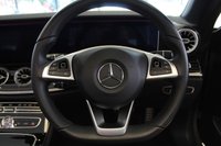 USED 2017 67 MERCEDES-BENZ E-CLASS 2.0 E 220 D AMG LINE PREMIUM PLUS 2d AUTO 192 BHP FINISHED IN STUNNING METALLIC ARAGONITE SILVER, COMPLIMENTED WITH FULL BLACK LEATHER, ELECTRICALLY ADJUSTABLE, MEMORY PROGRAMME, HEATED SEATS + 1 OWNER LOW MILEAGE MASTERPIECE, COMES WITH A  FULL SERVICE HISTORY AND A WONDERFUL SPECIFICATION LIST + COMAND ONLINE WITH FULL WIDESCREEN DIGITAL DASH DISPLAY + REVERSING CAMERA + 19 INCH AMG DIAMOND CUT ALLOY WHEELS + SATELLITE NAVIGATION + APPLE CARPLAY AND ANDROID AUTO + FRONT AND REAR PARKING ASSISTANCE + BLUETOOTH PHONE AND MEDIA CONNECTIVITY
