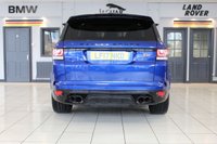 USED 2017 LAND ROVER RANGE ROVER SPORT 5.0 V8 SVR 5d 543 BHP FINISHED IN A STUNNING PREMIUM METALLIC BLUE, COMPLIMENTED WITH BLACK ELECTRIC ADJUSTABLE HEATED LEATHER SPORT SEATS WITH MEMORY PROGRAM + BEAUTIFUL, HUGE SPECIFICATION 4 WHEEL DRIVE + COMES WITH A FAULTLESS FULL SERVICE HISTORY + PANORAMIC GLASS SUNROOF + MERIDIAN AUDIO SYSTEM  + 22 INCH SPLIT SPOKE ALLOY WHEELS IN SATIN BLACK + SATELLITE NAVIGATION + FRONT AND REAR HEATED SEATS + REVERSING CAMERA + FRONT AND REAR PARKING SENSORS + BLUETOOTH INCLUDING MEDIA STREAMING + DIGITAL DASH DISPLAY