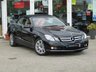 USED 2010 10 MERCEDES-BENZ E-CLASS 1.8 E250 CGI BLUEEFFICIENCY SE 2d 204 BHP Finished in OBSIDIAN BLACK with HEATED LEATHER trim. This CONVERTIBLE is well serviced with low mileage. This is an astonishing car in so many ways, not only is it a great medium family cab with loads of extras, it is also an eye catching sporty looking convertible. Features include Sat Nav, Heated Memory Leather seats, Neck Scarf, Cruise, Park Sensors and 17" Alloys . Dealer serviced at 5815 miles, 10935 miles, 22281 miles, 30437 miles, 33395 miles and on arrival at 37838 miles.
