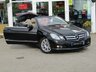 USED 2010 10 MERCEDES-BENZ E-CLASS 1.8 E250 CGI BLUEEFFICIENCY SE 2d 204 BHP Finished in OBSIDIAN BLACK with HEATED LEATHER trim. This CONVERTIBLE is well serviced with low mileage. This is an astonishing car in so many ways, not only is it a great medium family cab with loads of extras, it is also an eye catching sporty looking convertible. Features include Sat Nav, Heated Memory Leather seats, Neck Scarf, Cruise, Park Sensors and 17" Alloys . Dealer serviced at 5815 miles, 10935 miles, 22281 miles, 30437 miles, 33395 miles and on arrival at 37838 miles.