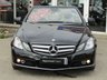USED 2010 10 MERCEDES-BENZ E-CLASS 1.8 E250 CGI BLUEEFFICIENCY SE 2d 204 BHP Finished in OBSIDIAN BLACK with HEATED LEATHER trim. This CONVERTIBLE is well serviced with low mileage. This is an astonishing car in so many ways, not only is it a great medium family cab with loads of extras, it is also an eye catching sporty looking convertible. Features include Sat Nav, Heated Memory Leather seats, Neck Scarf, Cruise, Park Sensors and 17" Alloys . Dealer serviced at 5815 miles, 10935 miles, 22281 miles, 30437 miles, 33395 miles and on arrival at 37838 miles.