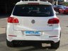 USED 2015 65 VOLKSWAGEN TIGUAN 2.0 R LINE EDITION TDI BMT 4MOTION DSG 5d 181 BHP Finished in PURE WHITE with contrasting HEATED EBONY LEATHER trim. This high spec Tiguan has a more sophisticated look to add to its high quality interior and high spec. Features include, Full Heated Leather, Sat Nav, DAB Radio, 19" ALLOYS, Auto Parking, Cruise control, Keyless Start, Front and Rear Park Sensors and much more. Dealer serviced at 6477 miles, 13821 miles, 19527 miles, 29132 miles, 32847 miles (Cam Belt and Water Pump) and at 38634 miles. MOT due 26/7/2022.