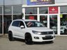 USED 2015 65 VOLKSWAGEN TIGUAN 2.0 R LINE EDITION TDI BMT 4MOTION DSG 5d 181 BHP Finished in PURE WHITE with contrasting HEATED EBONY LEATHER trim. This high spec Tiguan has a more sophisticated look to add to its high quality interior and high spec. Features include, Full Heated Leather, Sat Nav, DAB Radio, 19" ALLOYS, Auto Parking, Cruise control, Keyless Start, Front and Rear Park Sensors and much more. Dealer serviced at 6477 miles, 13821 miles, 19527 miles, 29132 miles, 32847 miles (Cam Belt and Water Pump) and at 38634 miles. MOT due 26/7/2022.
