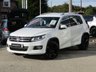 USED 2015 65 VOLKSWAGEN TIGUAN 2.0 R LINE EDITION TDI BMT 4MOTION DSG 5d 181 BHP Finished in PURE WHITE with contrasting HEATED EBONY LEATHER trim. This high spec Tiguan has a more sophisticated look to add to its high quality interior and high spec. Features include, Full Heated Leather, Sat Nav, DAB Radio, 19" ALLOYS, Auto Parking, Cruise control, Keyless Start, Front and Rear Park Sensors and much more. Dealer serviced at 6477 miles, 13821 miles, 19527 miles, 29132 miles, 32847 miles (Cam Belt and Water Pump) and at 38634 miles. MOT due 26/7/2022.