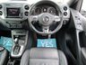 USED 2015 65 VOLKSWAGEN TIGUAN 2.0 R LINE EDITION TDI BMT 4MOTION DSG 5d 181 BHP Finished in PURE WHITE with contrasting HEATED EBONY LEATHER trim. This high spec Tiguan has a more sophisticated look to add to its high quality interior and high spec. Features include, Full Heated Leather, Sat Nav, DAB Radio, 19" ALLOYS, Auto Parking, Cruise control, Keyless Start, Front and Rear Park Sensors and much more. Dealer serviced at 6477 miles, 13821 miles, 19527 miles, 29132 miles, 32847 miles (Cam Belt and Water Pump) and at 38634 miles. MOT due 26/7/2022.