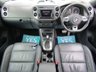 USED 2015 65 VOLKSWAGEN TIGUAN 2.0 R LINE EDITION TDI BMT 4MOTION DSG 5d 181 BHP Finished in PURE WHITE with contrasting HEATED EBONY LEATHER trim. This high spec Tiguan has a more sophisticated look to add to its high quality interior and high spec. Features include, Full Heated Leather, Sat Nav, DAB Radio, 19" ALLOYS, Auto Parking, Cruise control, Keyless Start, Front and Rear Park Sensors and much more. Dealer serviced at 6477 miles, 13821 miles, 19527 miles, 29132 miles, 32847 miles (Cam Belt and Water Pump) and at 38634 miles. MOT due 26/7/2022.